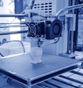 The process of working 3D printer and creating a three-dimensional object Royalty Free Stock Photo