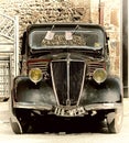 Black old vintage car in the main street in ErnÃÂ©e, Mayenne, France at the Foire st Gregoire 2018