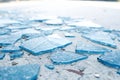 Processed collage of broken blue glass surface texture Royalty Free Stock Photo