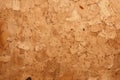 Processed collage of cork board or OSB board material texture. Background for banner, backdrop Royalty Free Stock Photo