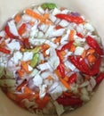 Food: Sliced of cabbage, shallots, carrots, cucumber, adding with chili peppers, sugar, salt, vinegar and enough water Royalty Free Stock Photo