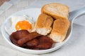 Processed meat with egg and pandesal Filipino bread for breakfast