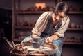 Processing clay ware and making dishes, process. Ceramics of handwork and clay ware on the potter`s wheel. Royalty Free Stock Photo