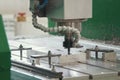 Processing of metal parts with CNC machine at factory with lathes Royalty Free Stock Photo