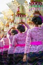 Procession of beautiful Balinese women in traditional costumes