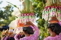 Procession of beautiful Balinese women in traditional costumes