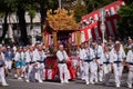 Procession of Kagura Yakata, small altars decorated with gold leaf, during Nagoya festival. Japan