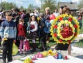 The procession and laying of flowers by schoolchildren to the memorial of fallen soldiers on may 9 in the Kaluga region of