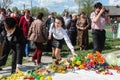 The procession and laying of flowers by schoolchildren to the memorial of fallen soldiers on may 9 in the Kaluga region of