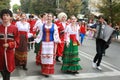 Procession of students of the Institute of culture, dancers in Cossack traditional dress, colored skirt, green trousers and maroon