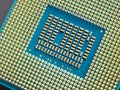 Processor microprocessor of a computer or laptop lies on a dark matte surface. Close-up. Electronic and computing equipment.
