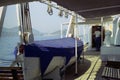 PROCIDA, ITALY, 1975 - A rescue boat ships on a ferry between Procida and Pozzuoli with the background of the Phlegrean coast