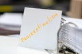 procrastination concept.procrastinating problem. written word at paper note stick. office paperwork stuff around it Royalty Free Stock Photo