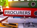 Procurers on Red Office Folder. Toned Image. 3D. Royalty Free Stock Photo
