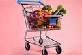 Produce grocery shopping cart vegetables food downtown market Royalty Free Stock Photo