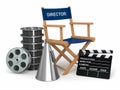 Producer chair, clapperboard and film reelsl. Royalty Free Stock Photo