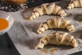 Producing classic small croissants at home or cafe. French pastry goods. Family cooking concept. Prepare croissant for bake Royalty Free Stock Photo