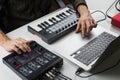 Producing electronic music on laptop with portable midi keyboard and electronic effect processors