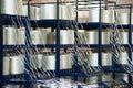 Producing fiberglass rods - manufacture of composite reinforcement Royalty Free Stock Photo