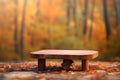 Product display wooden table and blurred autumn forest with colorful leaves landscape, autumn background layout. Generative AI Royalty Free Stock Photo