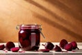 Product packaging mockup photo of jar of pickled beets, studio advertising photoshoot