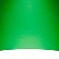 A minimalist image featuring a vivid green gradient background with a smooth texture. Royalty Free Stock Photo