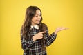 Product presentation. Small girl nice hairstyle. Child long curly hair. Happy schoolgirl stylish uniform. Happy