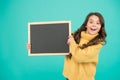 Product promotion. welcome on board. useful info here. happy small girl hold blackboard. best prices. big sales Royalty Free Stock Photo