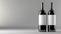 Product rendering of two red wine bottles with blank labels on studio background, copy space Royalty Free Stock Photo
