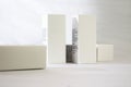 Product shot of four white rectangular boxes with copy space for text and branding