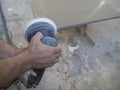 The production of acrylic worktops at a furniture factory. A worker produces acrylic countertops at the factory. A worker polishes