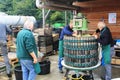 Traditional production of apple juice using pressing machine in Steinsel, Luxembourg