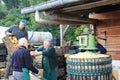 Traditional production of apple juice using the pressing machine in Steinsel, Luxembourg Royalty Free Stock Photo