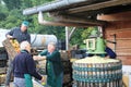 Traditional production of apple juice using the pressing machine in Steinsel, Luxembourg