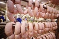 Production of boiled sausages and smoked sausage at a meat factory Royalty Free Stock Photo