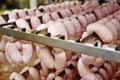 Production of boiled sausages and smoked sausage at a meat factory Royalty Free Stock Photo