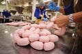 Production of boiled sausages and smoked sausage at a meat factory Royalty Free Stock Photo