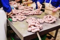 Production of boiled sausages and smoked sausage at a meat factory Royalty Free Stock Photo