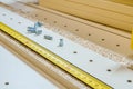 Production of cabinet furniture, installation of shelf holders on a furniture module