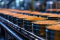 Production of canned fish. Tin cans of fish on the conveyor Royalty Free Stock Photo