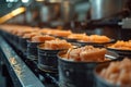 Production of canned fish. Tin cans of fish on the conveyor Royalty Free Stock Photo