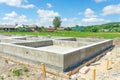 Production of the concrete base under the house with use of a removable timbering. Royalty Free Stock Photo