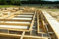 Production of the concrete base under the house with use of a removable timbering. Royalty Free Stock Photo