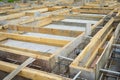 Production of the concrete base under the house with use of a removable timbering. Royalty Free Stock Photo