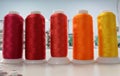 Production embroidery thread on reels