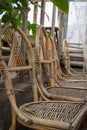 Production of furniture from the vine. Factory of creation of natural furniture. Manual production of furniture from Royalty Free Stock Photo