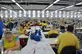 Production hall with workers in a textile industrial company Royalty Free Stock Photo