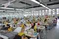 Production hall with workers in a textile industrial company Royalty Free Stock Photo