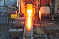 Production of hot steel in a steel mill - production factory in heavy industry Royalty Free Stock Photo