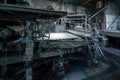 Production machine with rolls of new paper in waste paper recycling factory Royalty Free Stock Photo